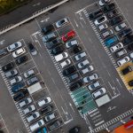 car-parking-near-shopping-mall-aerial-view-2026-03-17-03-33-34-utc